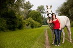 woman and hessian warmblood