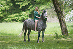 woman rides half-blood