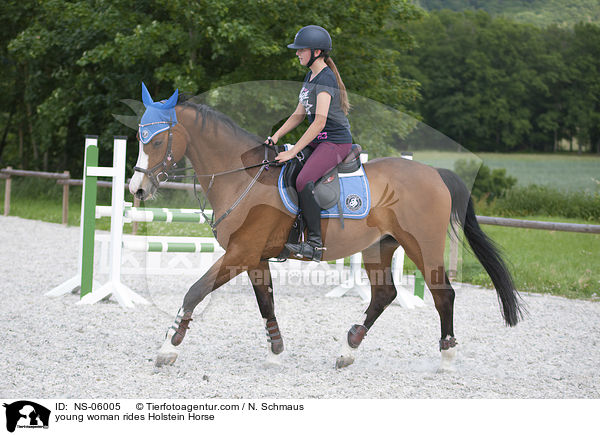 young woman rides Holstein Horse / NS-06005
