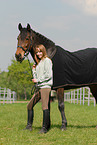 woman and Holsteiner horse
