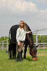 woman and Holsteiner horse