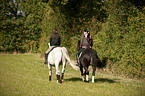 women rides horses