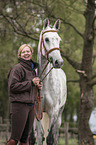 woman and Holstein Horse