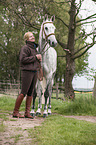 woman and Holstein Horse