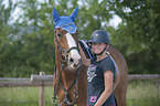 young woman with Holstein Horse