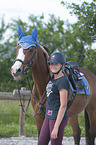 young woman with Holstein Horse