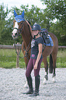 young woman with Holstein Horse