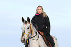woman rides crossbreed