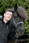 man and Icelandic horse