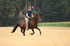 woman rides Icelandic horse