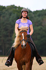 woman rides Icelandic horse