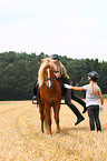 girls and Icelandic horse