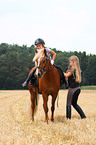 girls and Icelandic horse