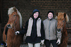 man and woman with Icelandic horses