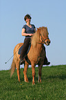 woman rides Icelandic horse