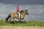 woman rides Icelandic horse