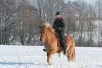 woman rides Icelandic horse