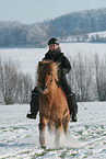 woman rides Icelandic horse