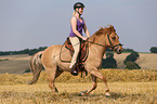woman rides Icelandic horse