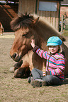 child and Icelandic horse