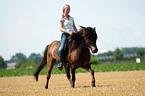 woman rides Icelandic horse