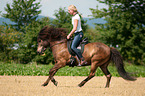 woman rides Icelandic horse