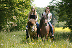 women rides Icelandic horses