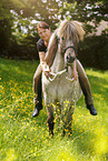 woman rides Icelandic horse