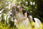 woman rides Icelandic horse