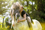 woman rides Icelandic horse
