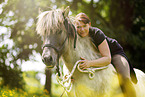 woman rides Icelandic horse