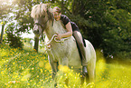 woman rides Icelandic horse