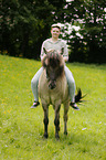 woman rides Icelandic horse