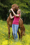 woman and Icelandic horse