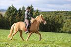 woman rides Icelandic horse