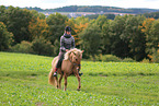 woman rides Icelandic horse