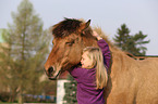 girl and Icelandic Horse