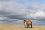 girl and Icelandic Horse
