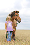 girl and Icelandic Horse