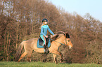 woman rides Icelandic horse