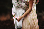 woman and Icelandic horse