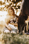 woman with icelandic horse and havanese