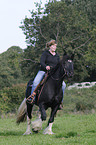 woman rides Irish Tinker