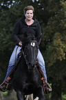 woman rides Irish Tinker