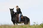 woman rides Irish Tinker