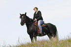woman rides Irish Tinker