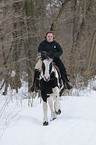 woman rides Irish Tinker