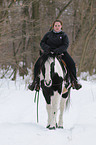 woman rides Irish Tinker