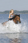 woman rides Lewitzer