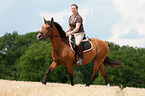 woman rides Lusitano